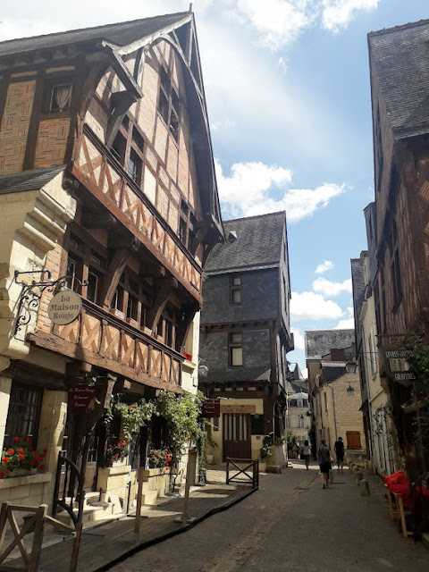 Ancient half-timbered house on street in Chinon