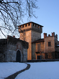 A snowy scene at the Castello Visconti di San Vito