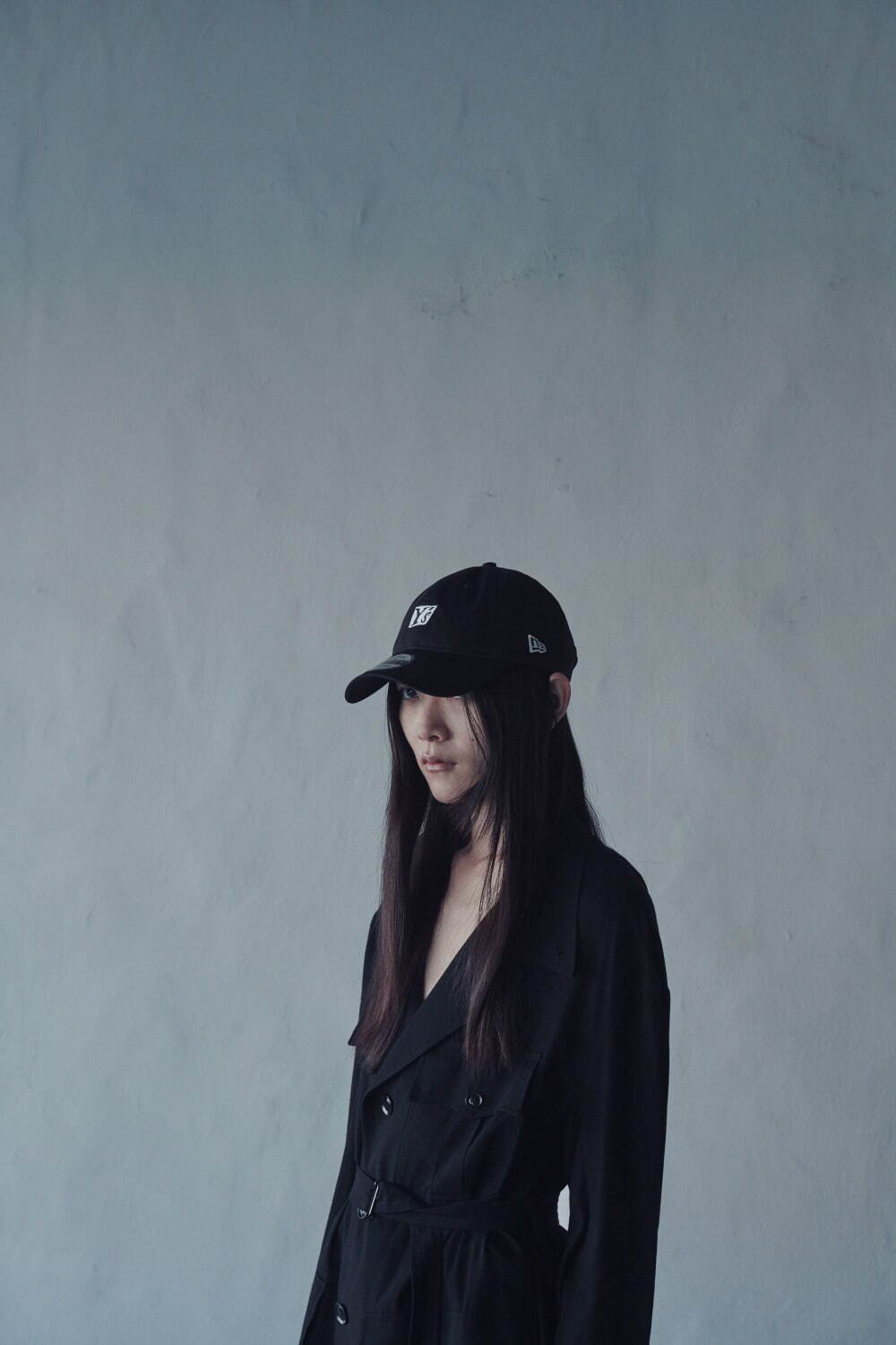 Image may contain Y's Yohji Yamamoto Clothing Apparel Human Person Fashion Bucket Long Sleeve Hoodie and cap