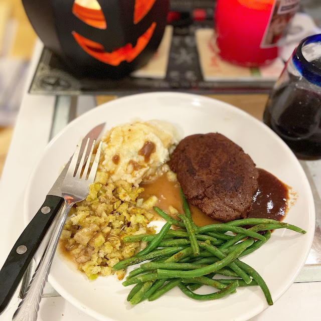 A plate of steak, mashed potatoes, and green beans totally plant-based