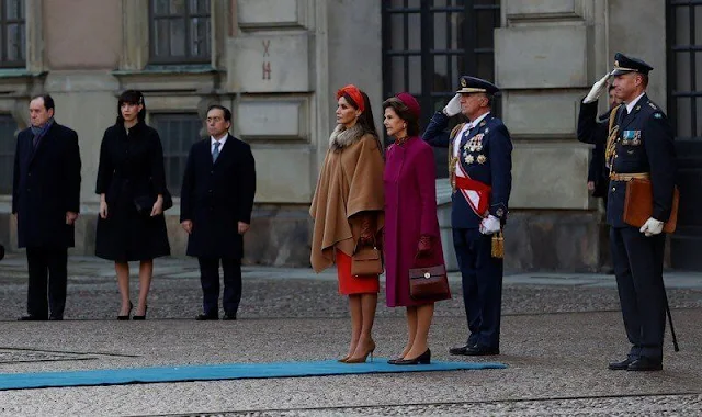 Crown Princess Victoria, Princess Sofia, Queen Silvia. Queen Letizia wore a headband by Cherubina. Carolina Herrera bag. cape