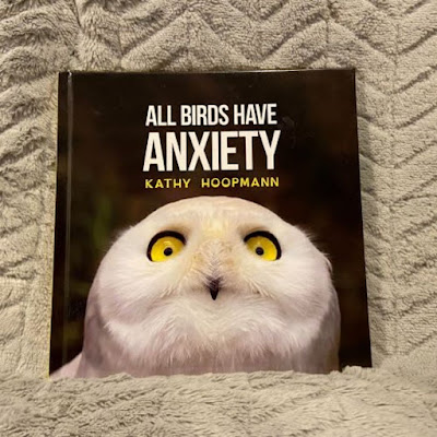 white owl on book cover