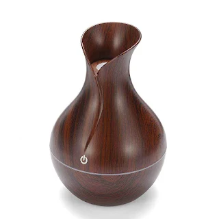 The ultra-quiet portable ultrasonic humidifier keeps your living space clean and properly moisturized Deep Wood grain hown - store