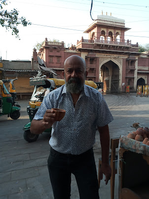 Sipping early morning tea near "Sardar Market" in Jodhpur.Tea served in clay mugs.