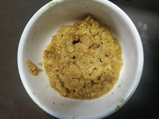 Roasted besan in a bowl for pahadi kabab