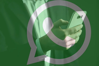 Whatsapp image showing person using whatsapp on his phone with hands