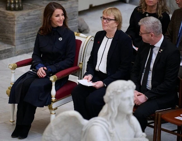 Princess Marie wore a new pleated inset trench coat by Sandro, and a new eilish floral crepe georgette top by Emilia Wickstead