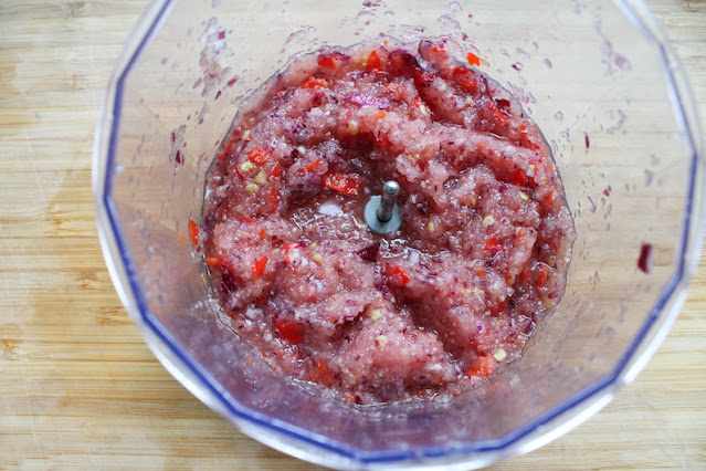 Making a paste out of the onion, garlic and chili peppers