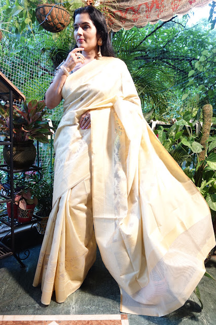 Jute, linen net Banarasi saree with lotus woven border