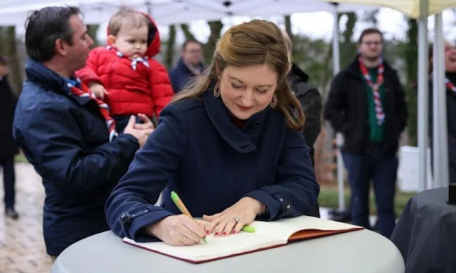 Princess Stephanie wore a blue Gibbsmoore coat by Burberry. Prince Charles wore a red puffer jacket by Petit Bateau