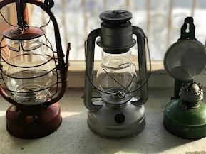three kerosene lamps