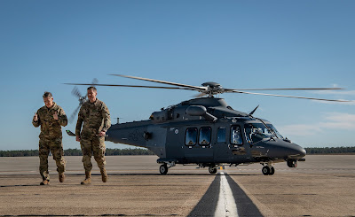 General Timothy Ray of Air Force Global Strike Command and Colonel Michael Jiru of Air Force Materiel Command disembark an MH139A Grey Wolf on the 19th of December 2019