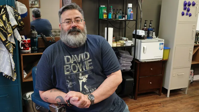Scott Mousseau, manager of Vintage Barber Shop and Tattoo in Smiths Falls, Ont., says the reconstruction of the town's main downtown thoroughfare has made a 'world of difference' for some local business owners.