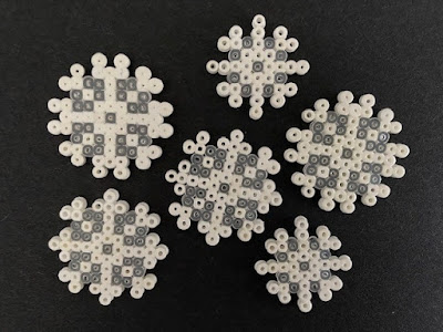 Mini Hama bead snowflake embellishments
