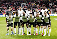 VALENCIA C. F. Temporada 2021-22. Jaume Domenech, Alderete, Thierry Correia, Gonçalo Guedes, Diakhaby. Lato, Musah, Foulquier, Carlos Soler, Hugo Duro y Hugo Guillamón. CLUB ATLÉTICO DE MADRID 3 VALENCIA C. F. 2 Sábado 22/01/2022, 21:00 horas. Campeonato de Liga de 1ª División, jornada 22. Madrid, estadio Wanda Metropolitano: 44.999 espectadores. GOLES: 0-1: 25’, Yunus Musah. 0-2: 44’, Hugo Duro. 1-2: 64’, Matheus Cunha. 2-2: 90+1’, Ángel Correa. 3-2: 90+3’, Mario Hermoso