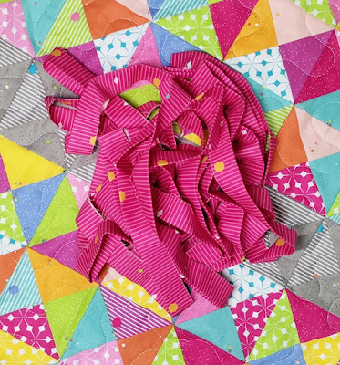 Flutterfly butterfly quilt made with Colour Wall fabric from Riley Blake Designs