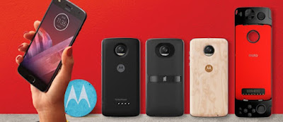 Multiple Moto Mods in showcase. From left to right, Moto TurboPower, JBL Moto Mods, Moto Mods Cover, and Moto Gamepad.