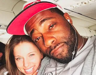 Brian Banks clicking selfie with a beautiful lady