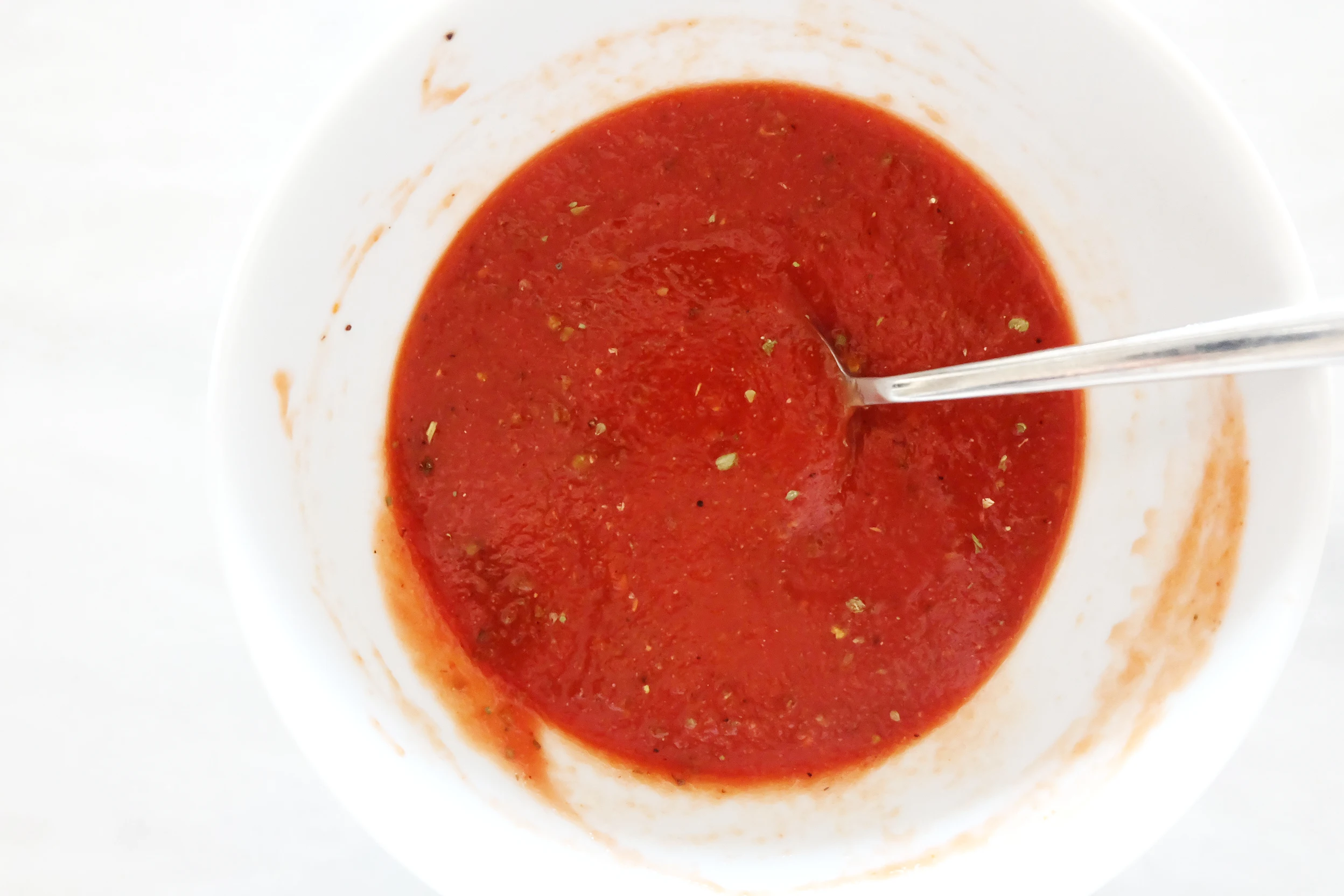 homemade pizza sauce mixed in a bowl