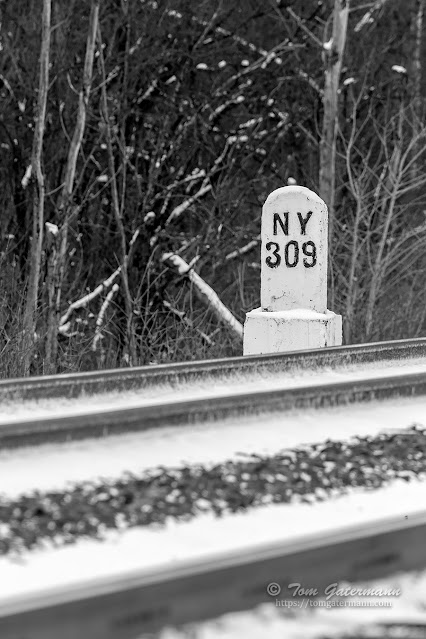 NYC's old milepost 309 still stands west of Pump Road