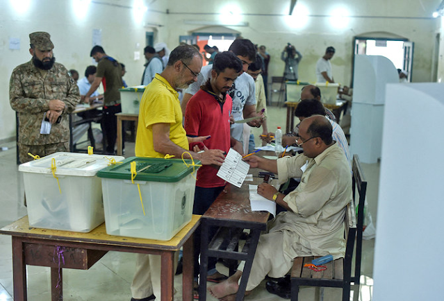 Pakistan prepares for pivotal election as one of the leading candidates serves jail time