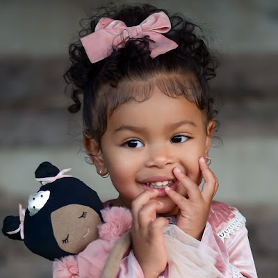 Baby with earrings