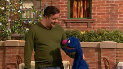 Sesame Street Episode 4422. Ricky Gervais and Grover talk about stumble.