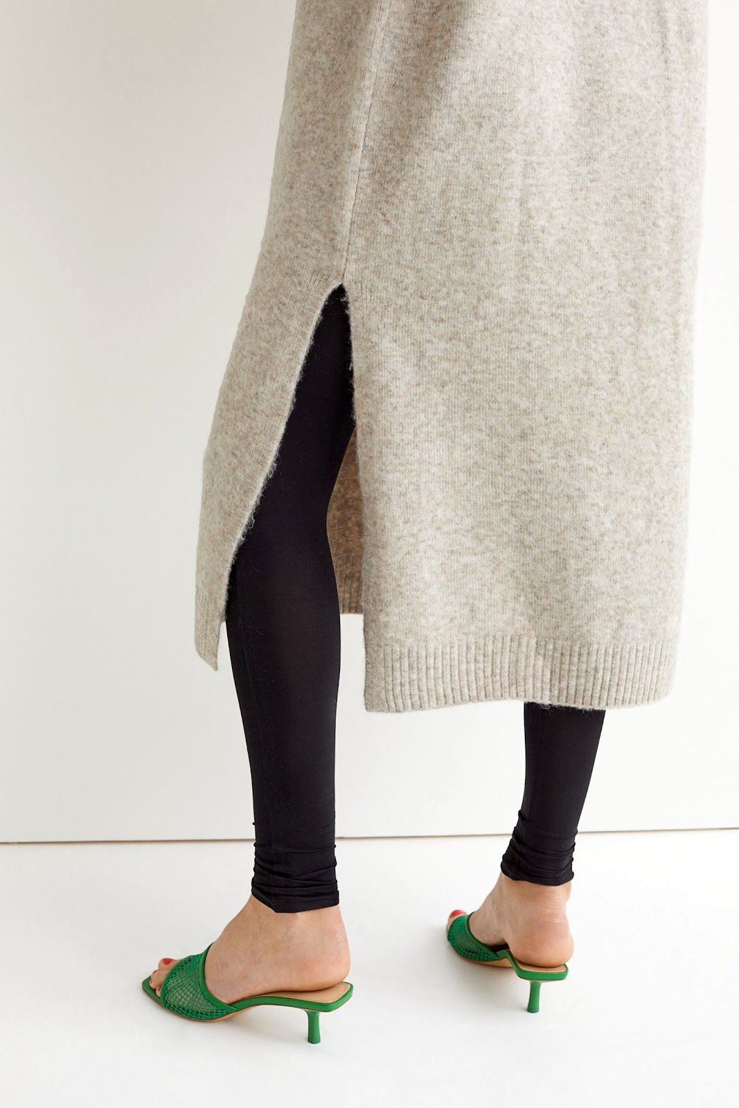 Easy Last Minute Holiday Party Outfit Idea — Cozy Chic Minimalist Look With Long SweaterDress, Classic Black Leggings and Green Mesh Mule Heels