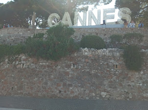 " CANNES" lettering on Hilltop Medieval Fortress.