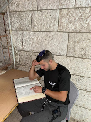 Elad Friedman studying Torah