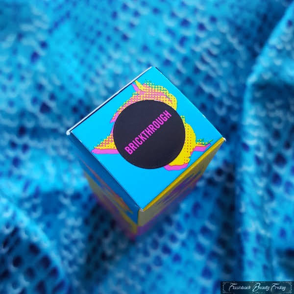 top of lipstick box with shade name Brickthrough on sticker