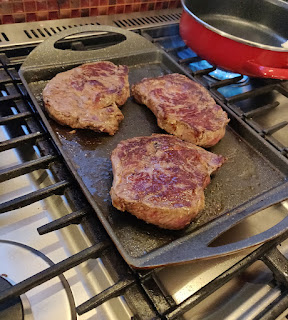 Getting some steaks cooked up