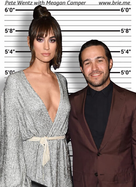 Pete Wentz standing with Meagan Camper in front of a height chart background