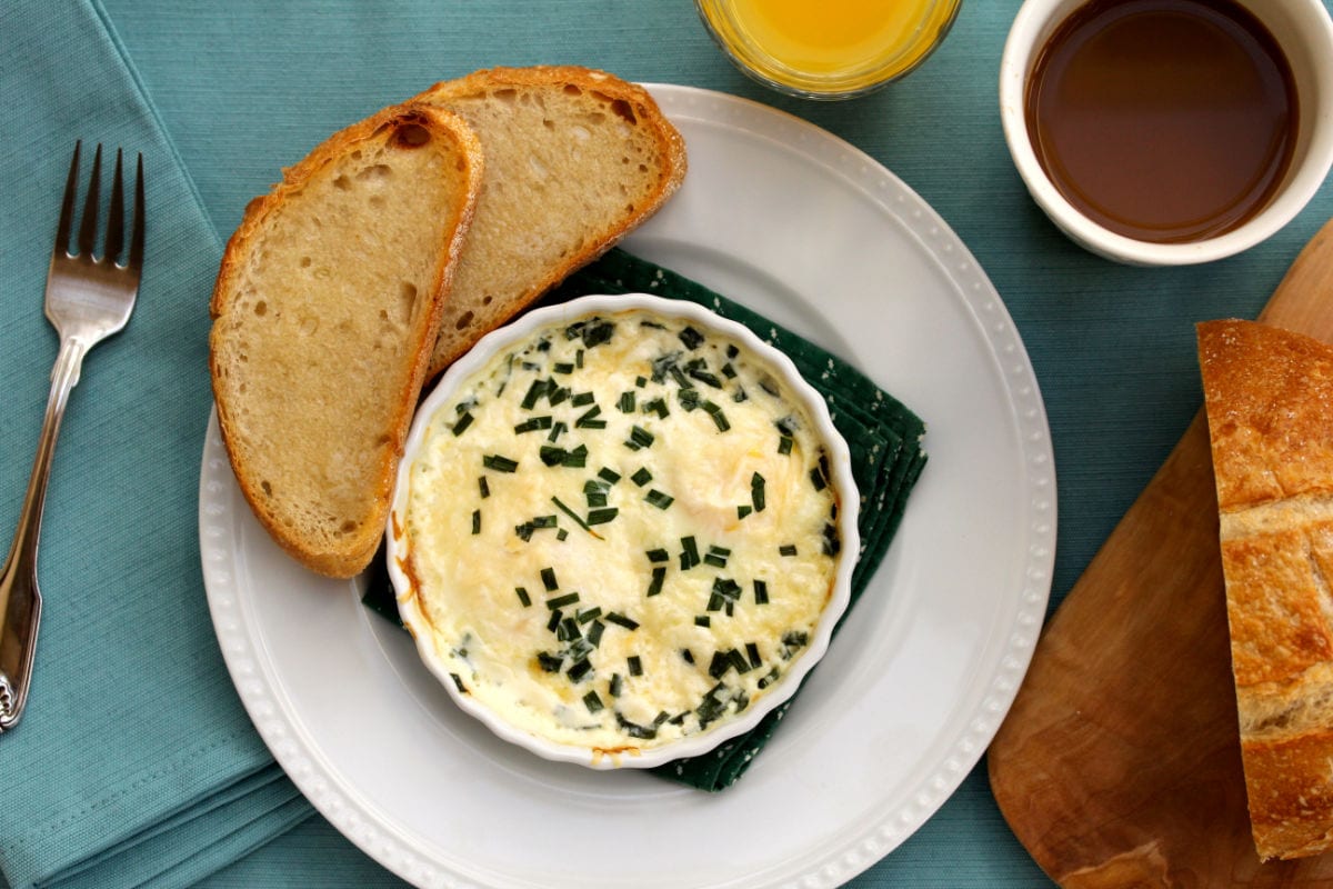 Baked eggs with Parmesan and Chives with toast.