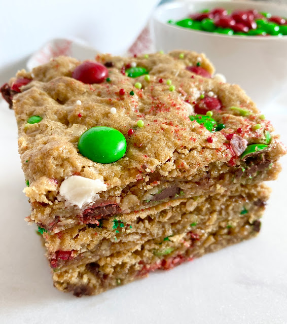 Close up shot of monster cookie bars piled on top of each other