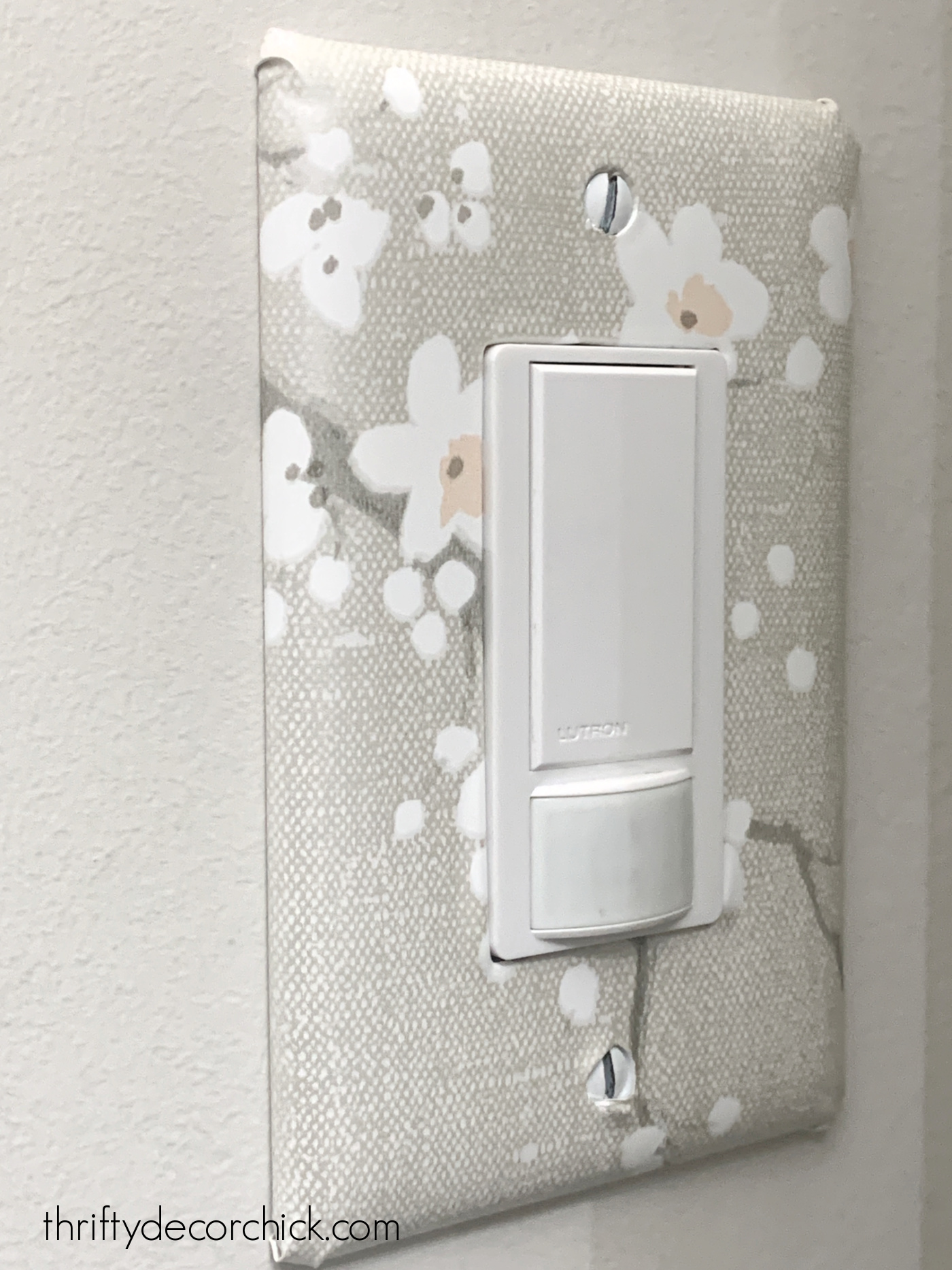 wallpapered switch plate