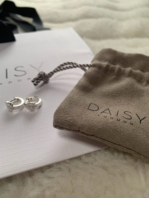 Silver earrings from Daisy