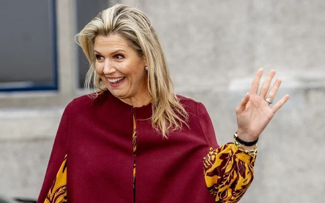 Queen Maxima wore a botanical-print silk maxi dress from Johanna Ortiz, and red wool cape from Natan