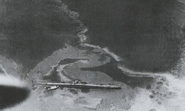 Italian submarine beached in Spain, 8 June 1942 worldwartwo.filminspector.com