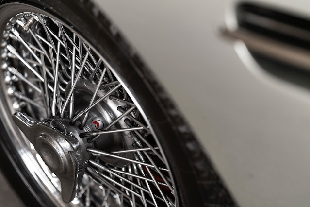 The chrome wire wheels of the 1963 - 1966 Aston Martin DB5
