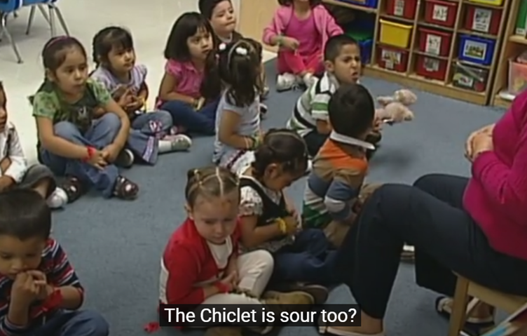 A group of children sitting on the floor

AI-generated content may be incorrect.