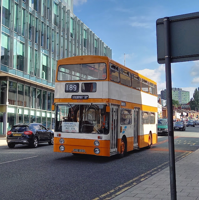 An old orange Manchester SELNEC bus on a Farewell to Stockport Bus Station Tour