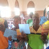 CAC World Evangelistic Outreach baptizes new converts from Alagbagba rural evangelism, gives baptismal certificate