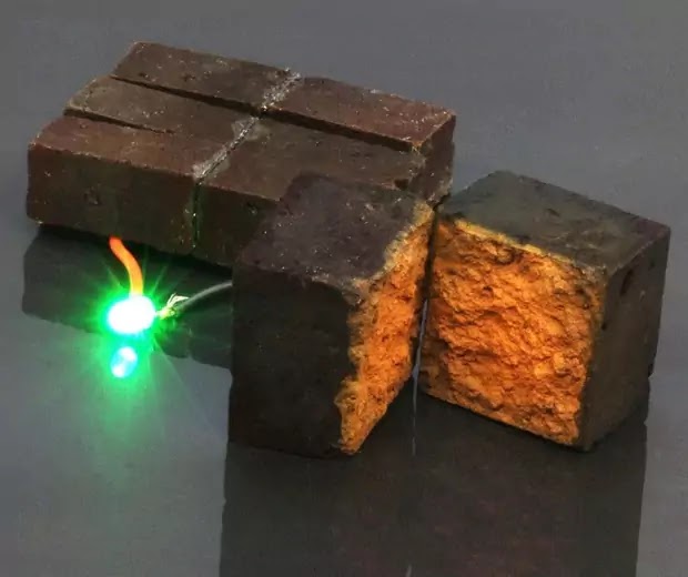 Red block machine created via way of means of scientists at Washington University in St. Louis illuminates an inexperienced light-radiating diode (D'Arcy studies middle: Washington University in St. Louis)
