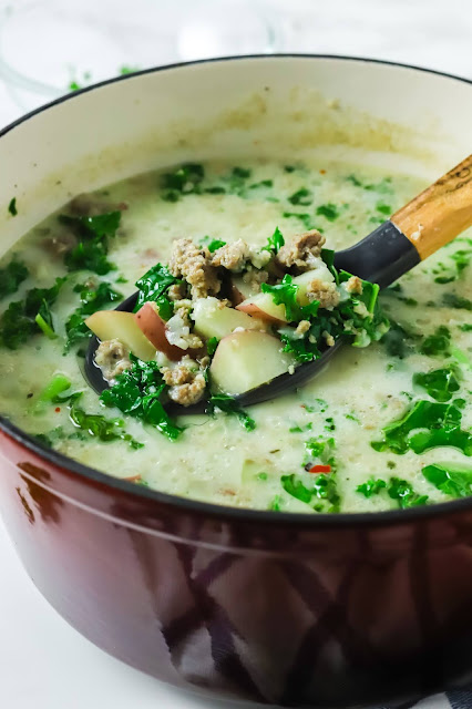 pot of soup with spoon.