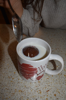 hot chocolate bomb in hot milk