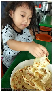 The master brought Aina to eat roti canai at the mamak shop in our residential area after sending Mummy and Aidan to the Salak Health Clinic.