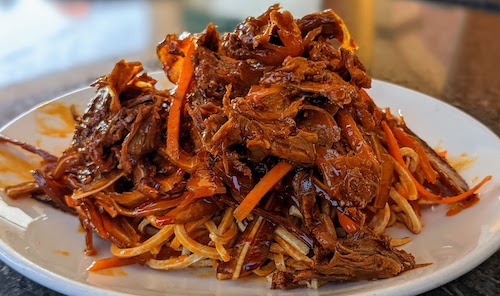 Hot and spicy beef, pig ears, and shredded bean curd