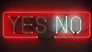 An image of a neon sign saying yes no