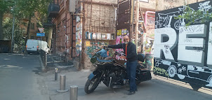 A photo shoot with a 1800 cc Harley Davidson bike at Fabrika Hostel.compound.